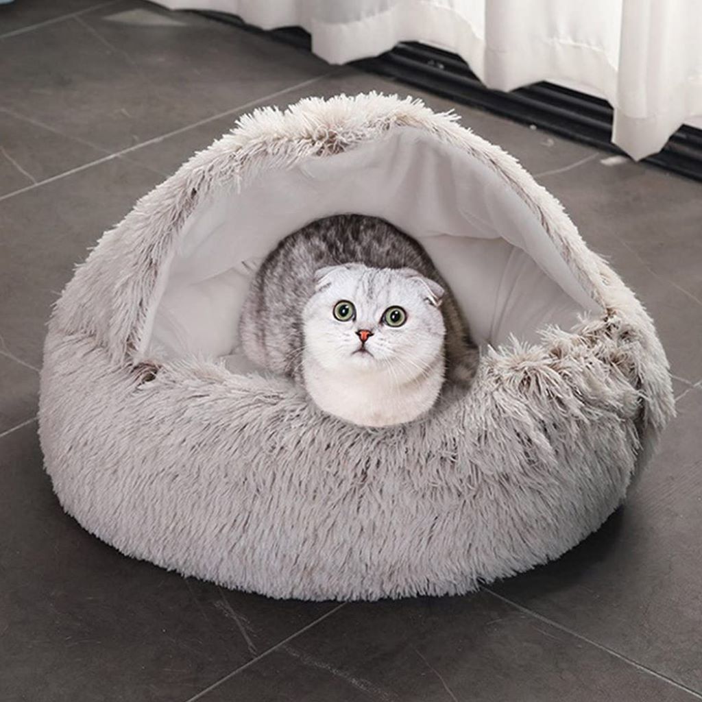 Cama redonda para mascotas con interior esponjoso calmante