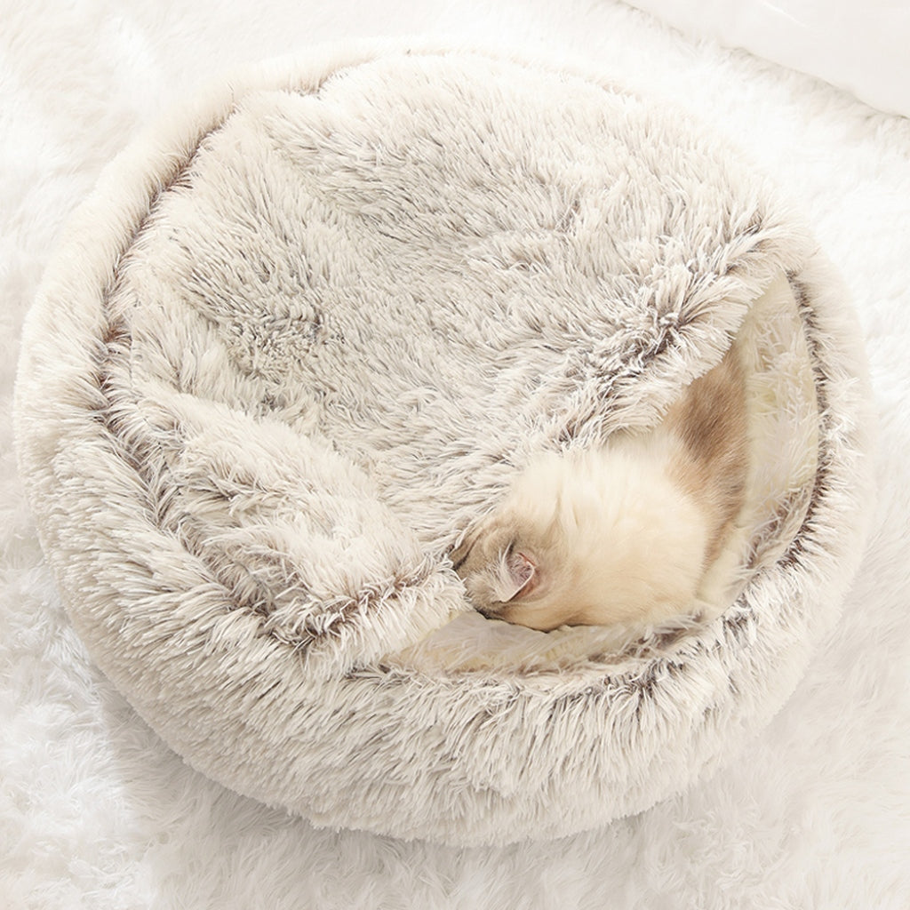 Cama redonda para mascotas con interior esponjoso calmante